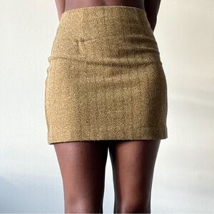 Mustard yellow mini skirt. Size 4.